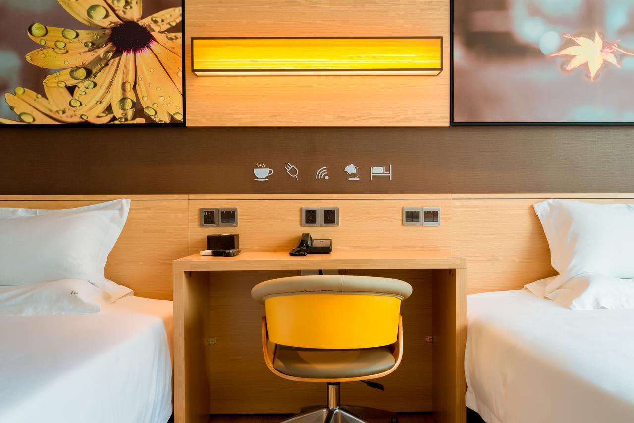 Iu Hotel Zhanjiang Haibin Avenue Xinhaimingchen Exterior photo
